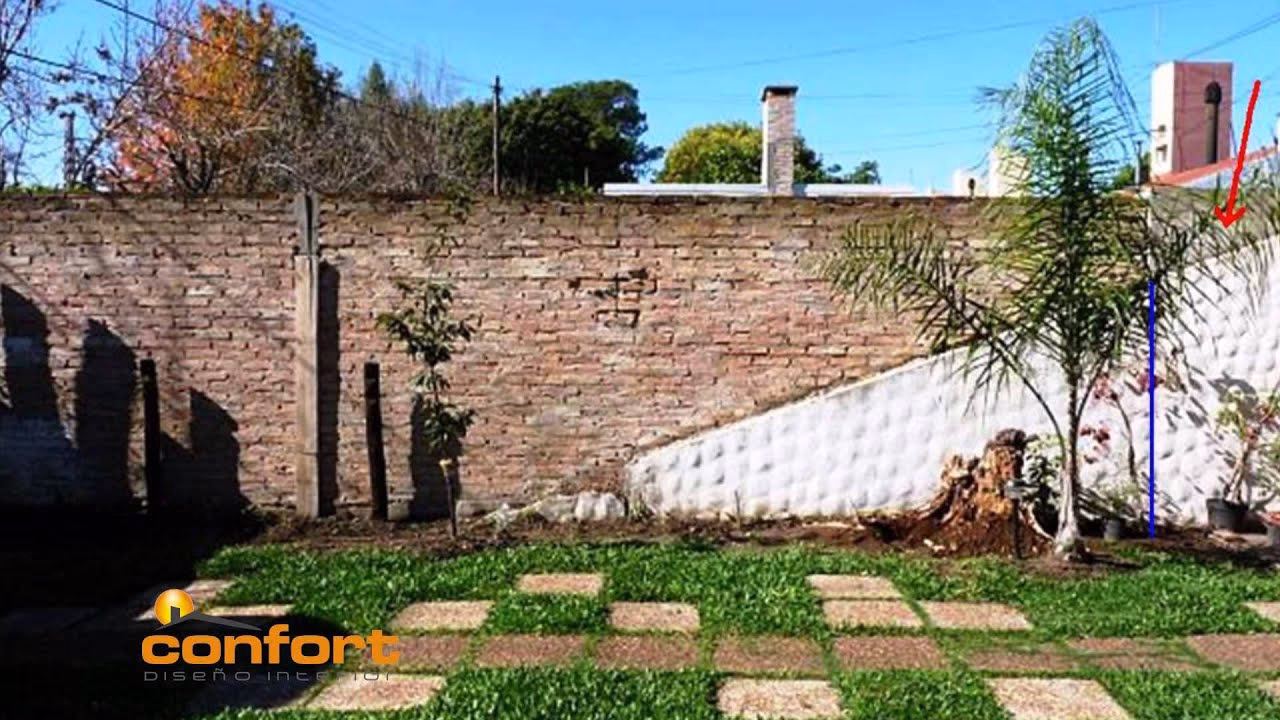 ¿Quién paga la construcción de un muro medianero?